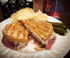 Carshon’s Deli signature dishes Reuben Sandwich, Pastrami on Rye, Matzo Ball Soup, Corned Beef Sandwich, Potato Knish, Cheesecake.